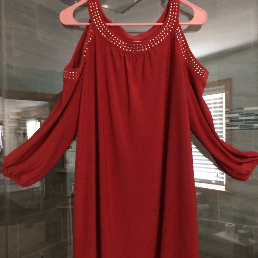 Women’s studded hollow shoulder blouse. Rust color